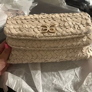 Sam Edelman Bianka woven leather clutch in cream.